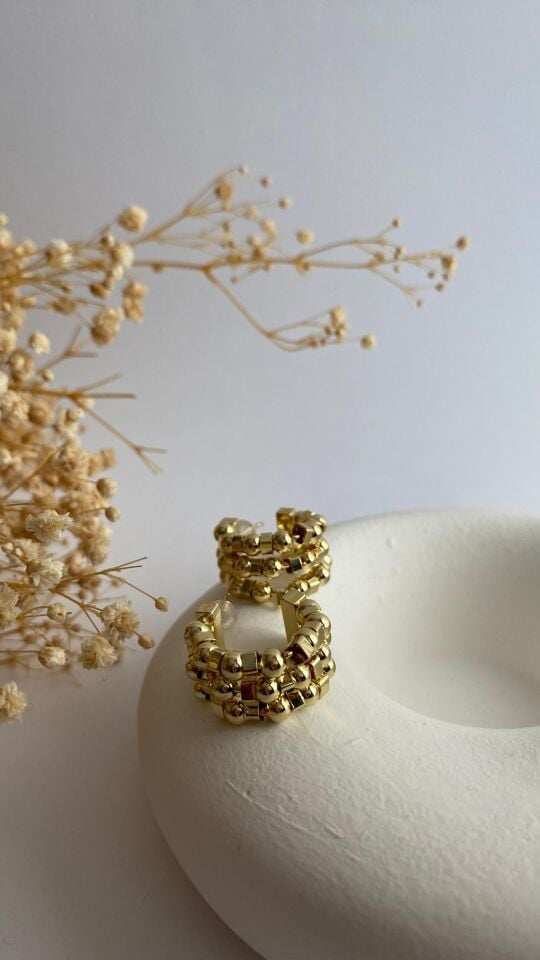 Üç sıralı yarım ay şekilli küpe