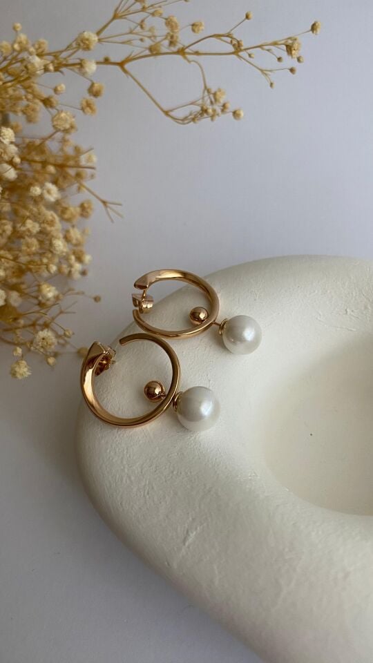 İncisi çıkabilen yuvarlak formlu küpe