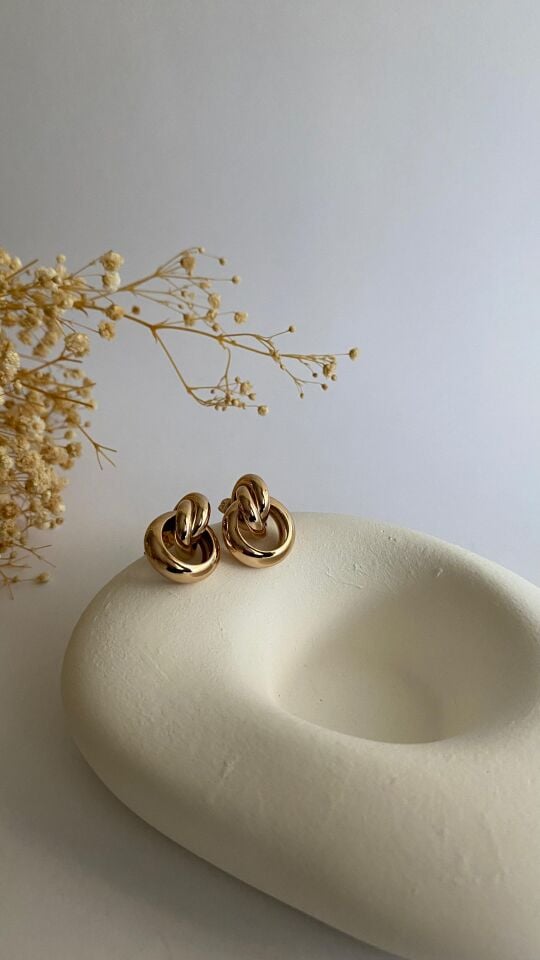 Rose gold düğüm form küpe