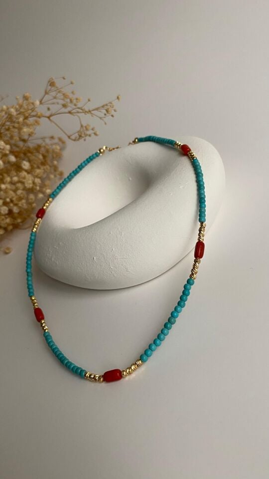 Araları kahve taşlı mavi kolye