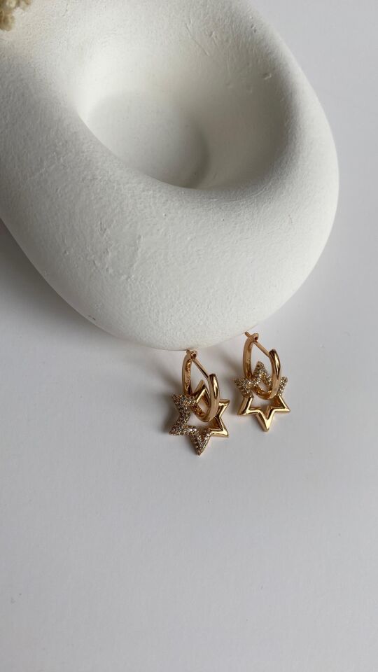 Rose gold yarısı taşlı yıldız uçlu küpe